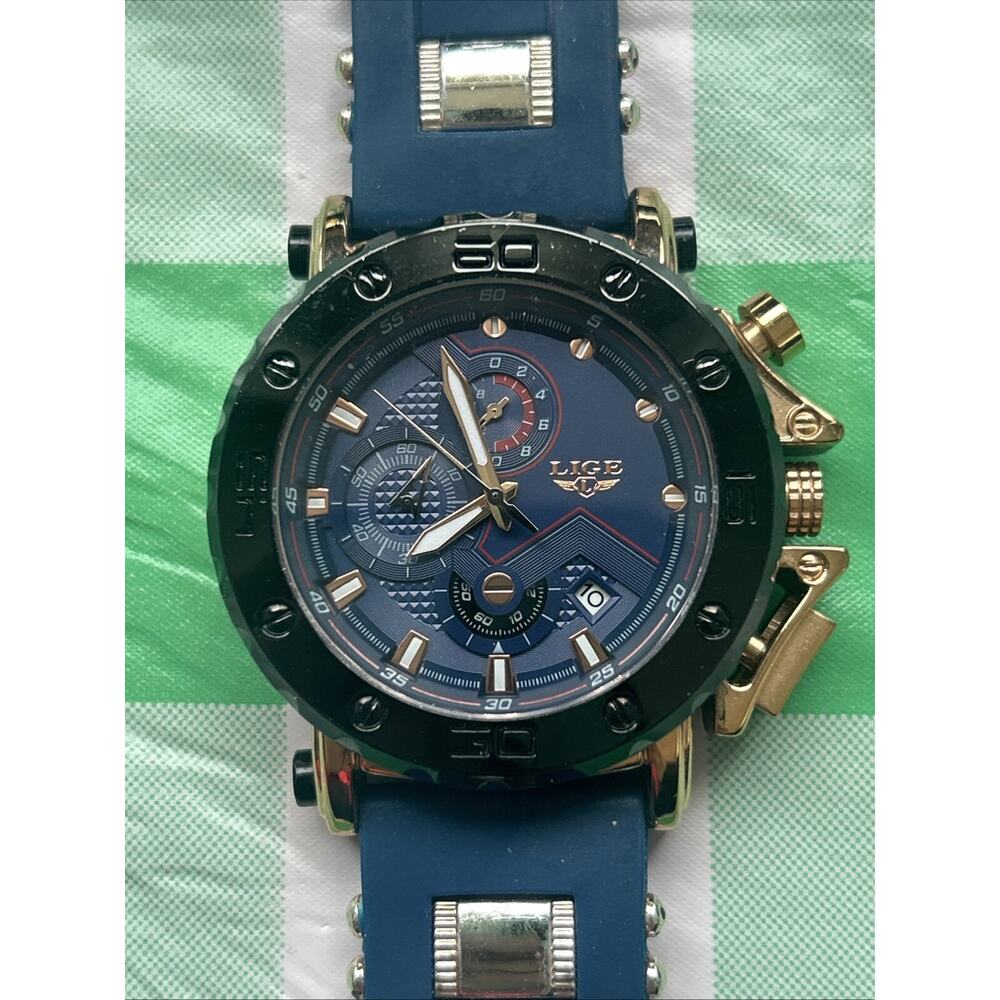 Lige Blue Dial Rose Gold Tone Case Black Bezel Men’s Watch